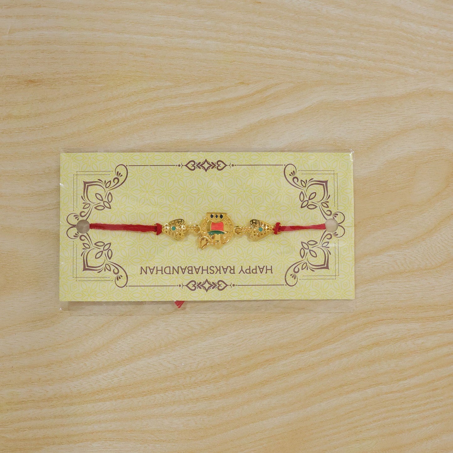 Stylish Golden Om Rakhi with Red Thread for Brother | Divine Rakshabandhan Rakhi
