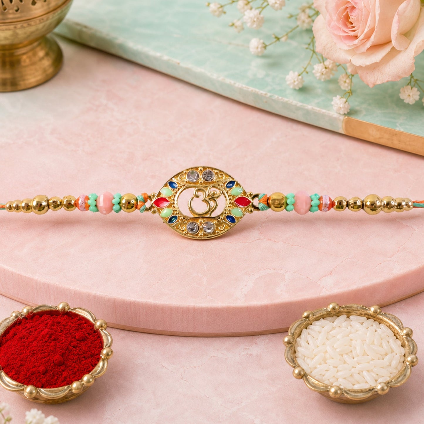 Round Om Designer Rakhi with Pearl Beaded Festive Detail