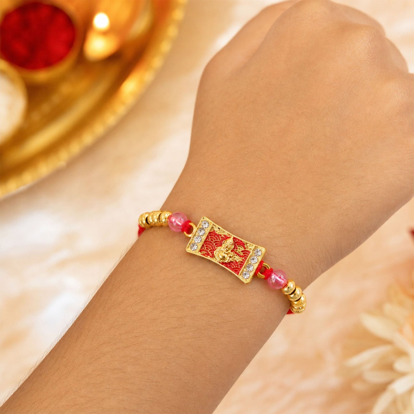 Ganesh Motif Designer Rakhi with Kundan Beaded Festive Detail