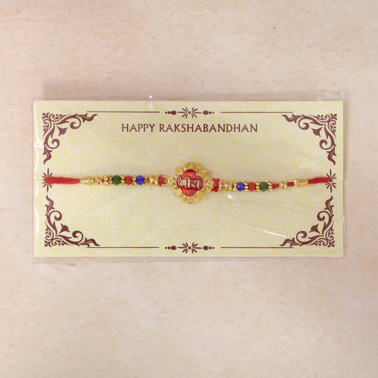 Veera Text Designer Rakhi with Pearl Beaded Traditional Detail