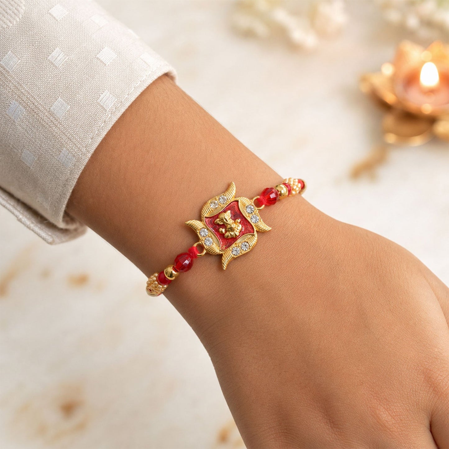 Ganesha Motif Designer Rakhi with Stone Beaded Festive Detail