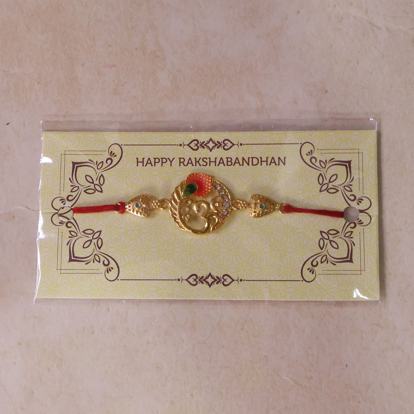 Om Peacock Designer Rakhi with Kundan Beaded Traditional Detail