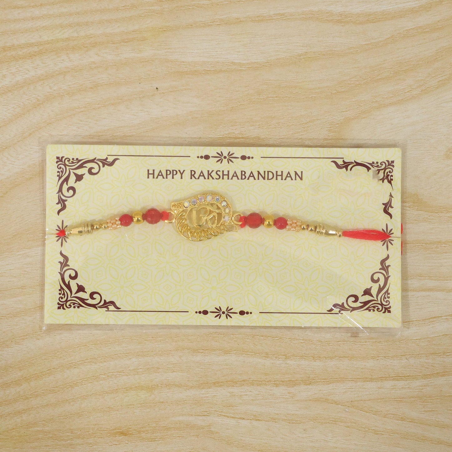 Round Om Pearl Beaded Sacred Rakhi Pattern for Raksha Bandhan