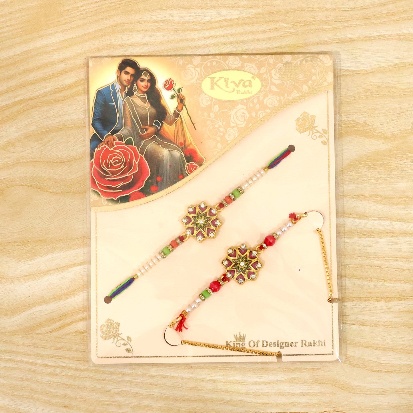 Two floral Kundan bracelets with colorful beads and pearls, packaged on a card with an illustration of a couple and a red