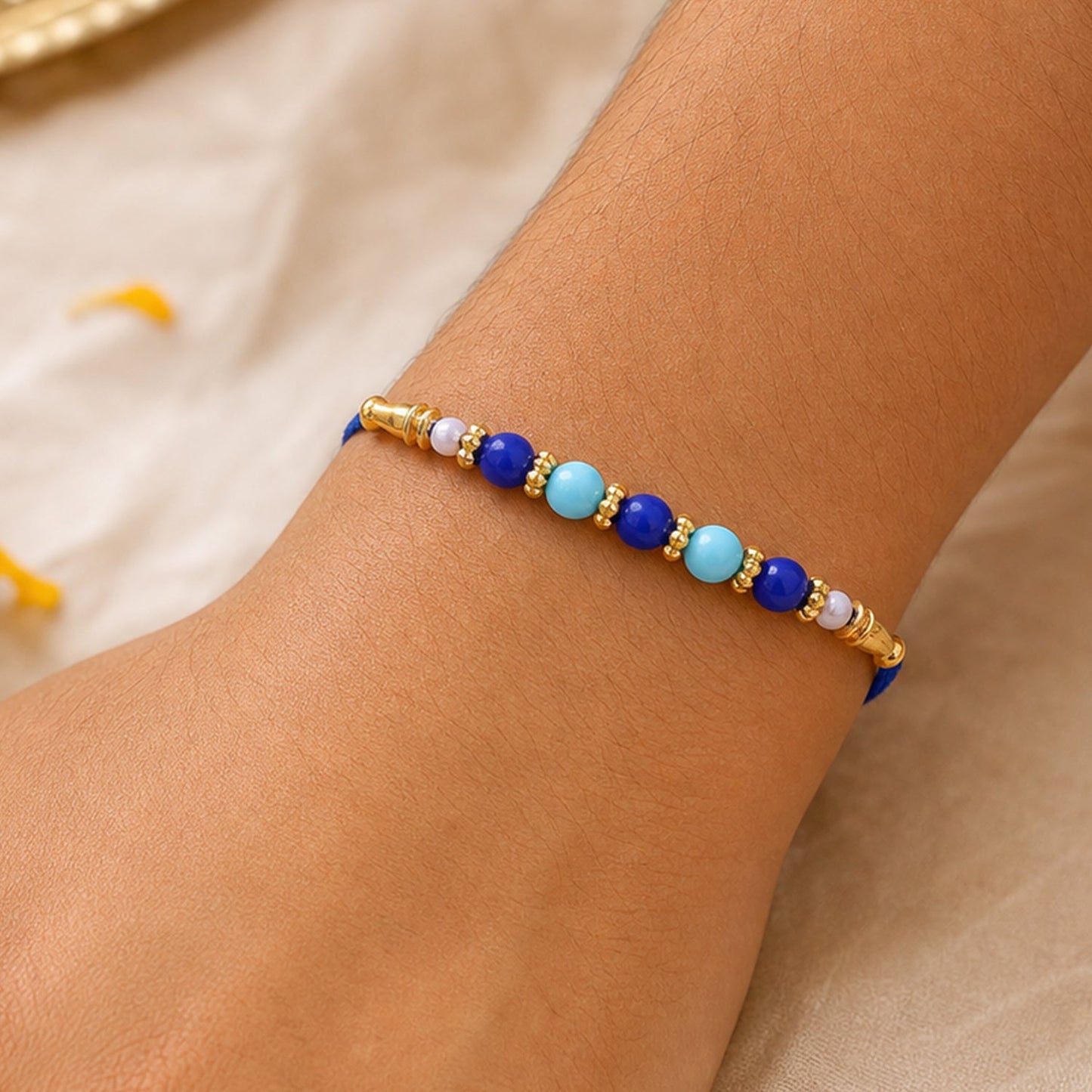 Pearl Beaded Simple Traditional Rakhi with Elegant Festive Detail