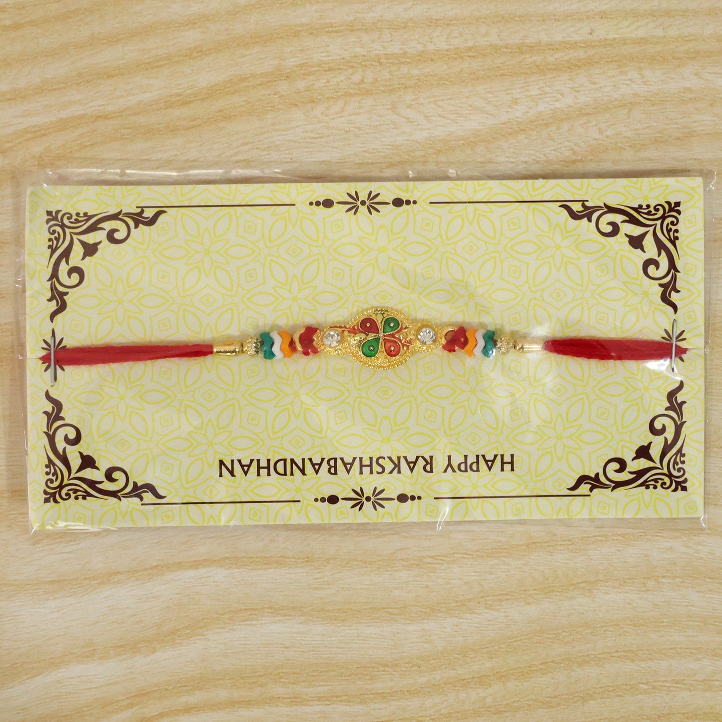 Floral Leaf Motif Beaded Rakhi with Pearl Accent Center Design