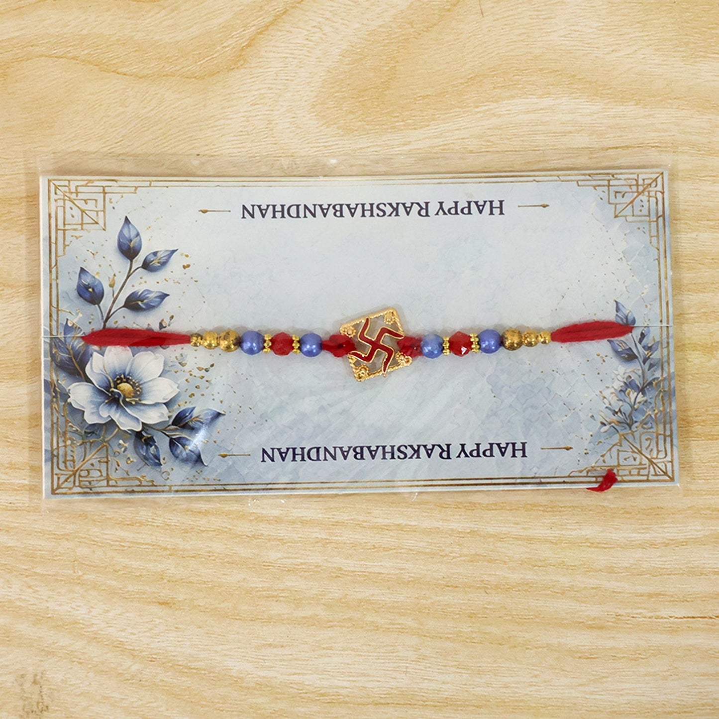 Swastik Beaded Rakhi with Traditional Pearl Accent Center Design