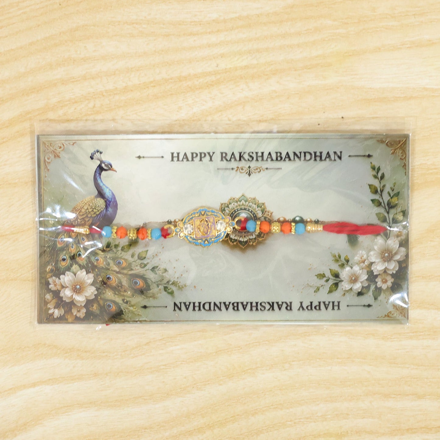 Round Ganesha Motif Stone Rakhi with Pearl Beads and Sacred Center Detail