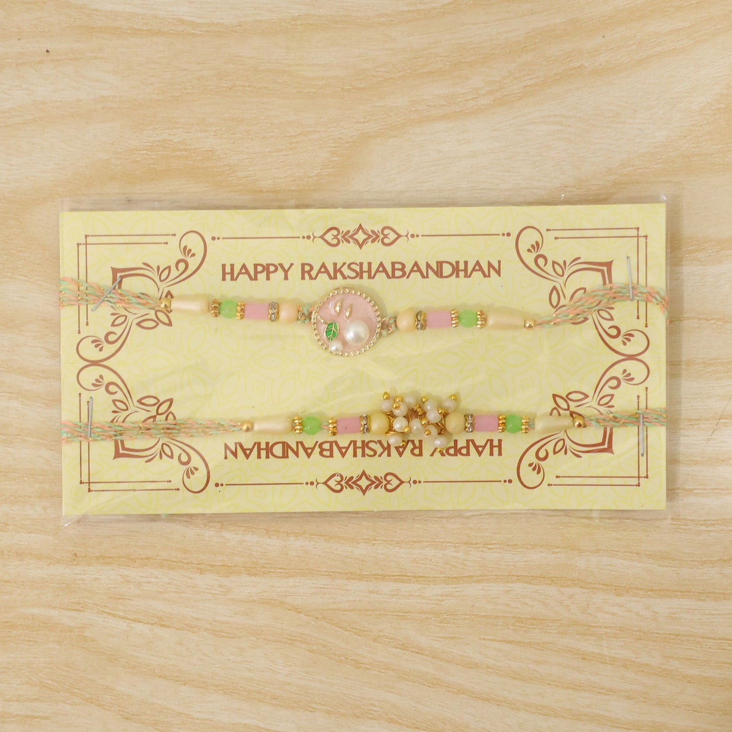 Premium Round Charm Bhai Bhabhi Lumba Rakhi with Pearl Hanging