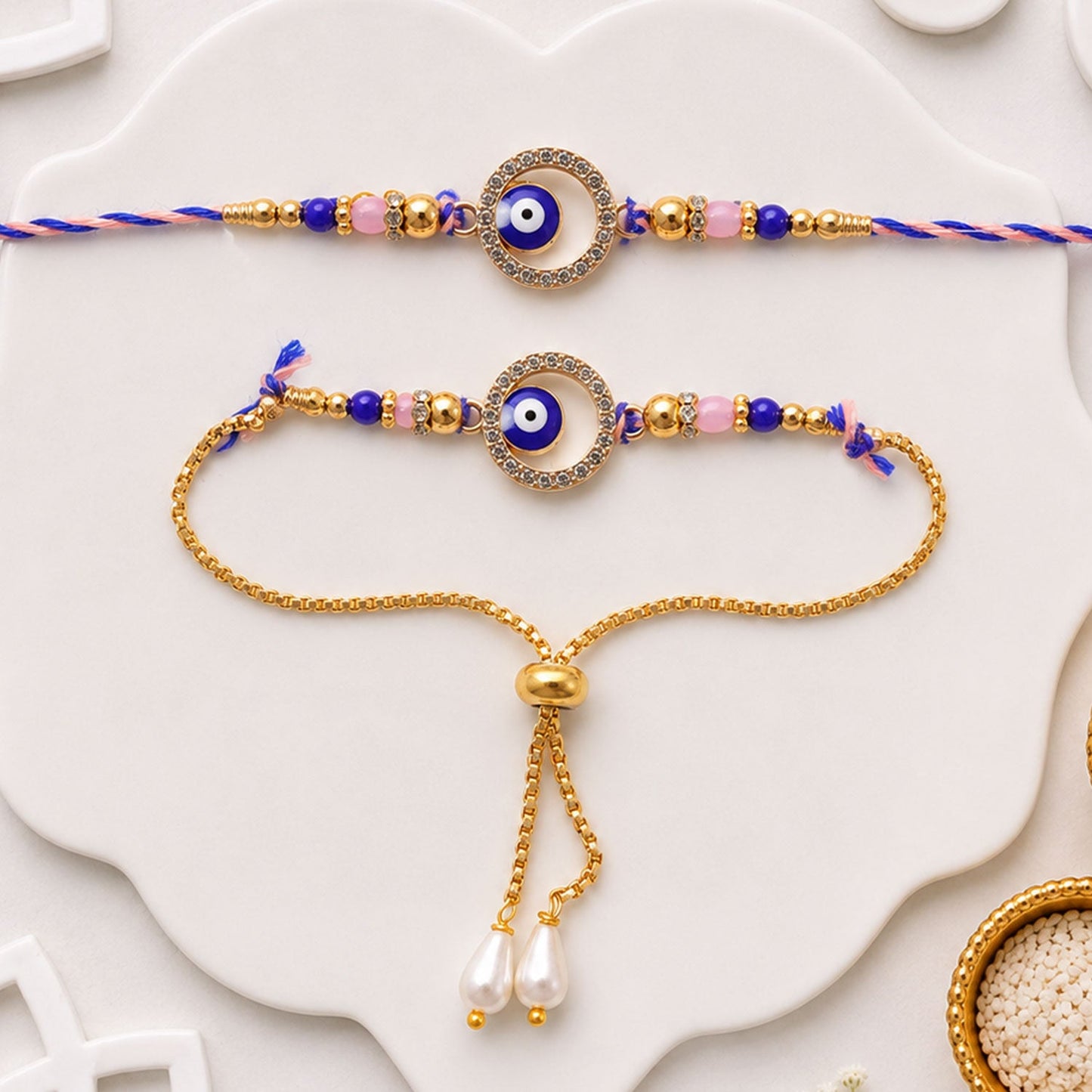 Premium Evil Eye Bhai Bhabhi Lumba Rakhi Set with Pearl Tassel Chain