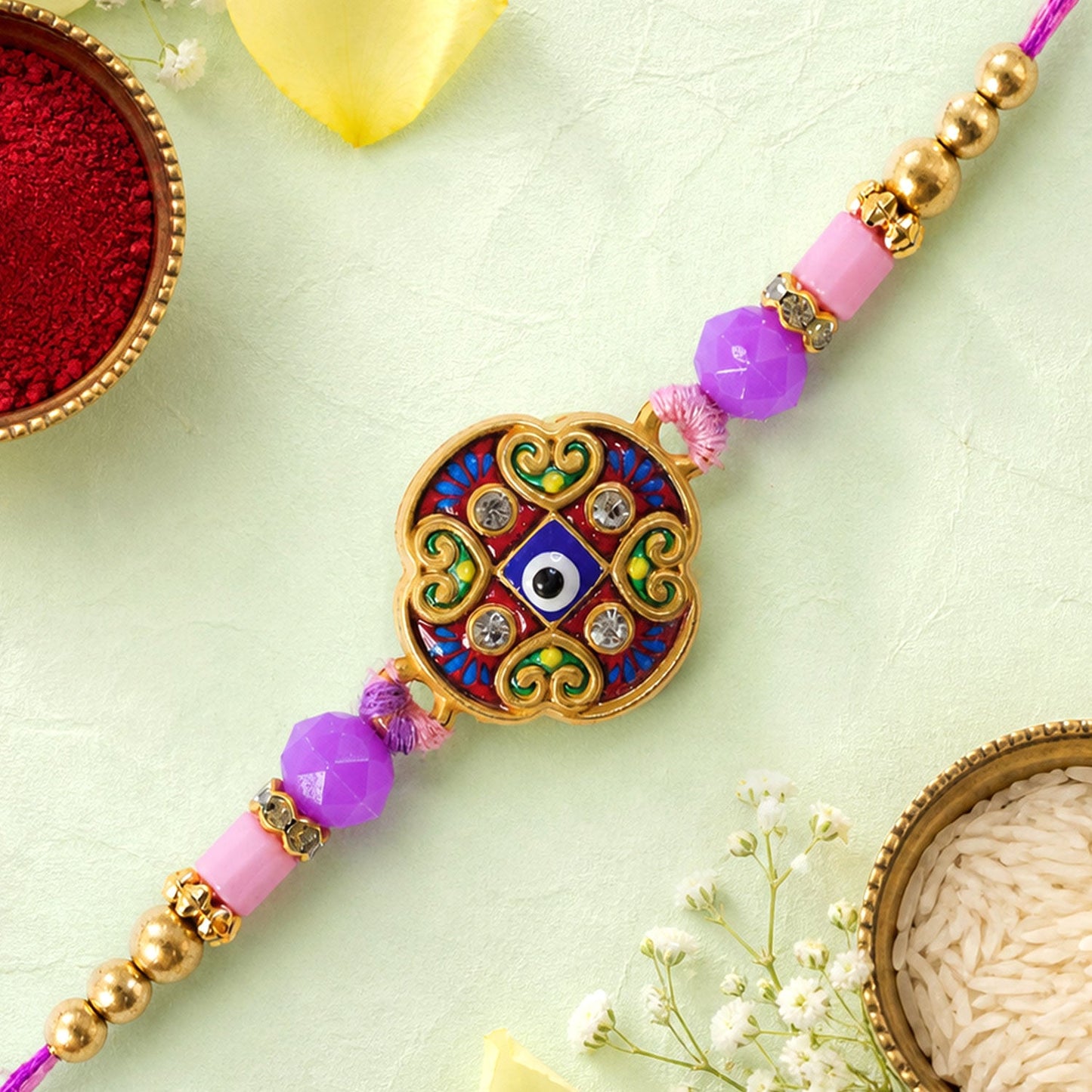 Round Evil Eye Mandala Stone Rakhi with Pearl Beads and Festive Center Charm