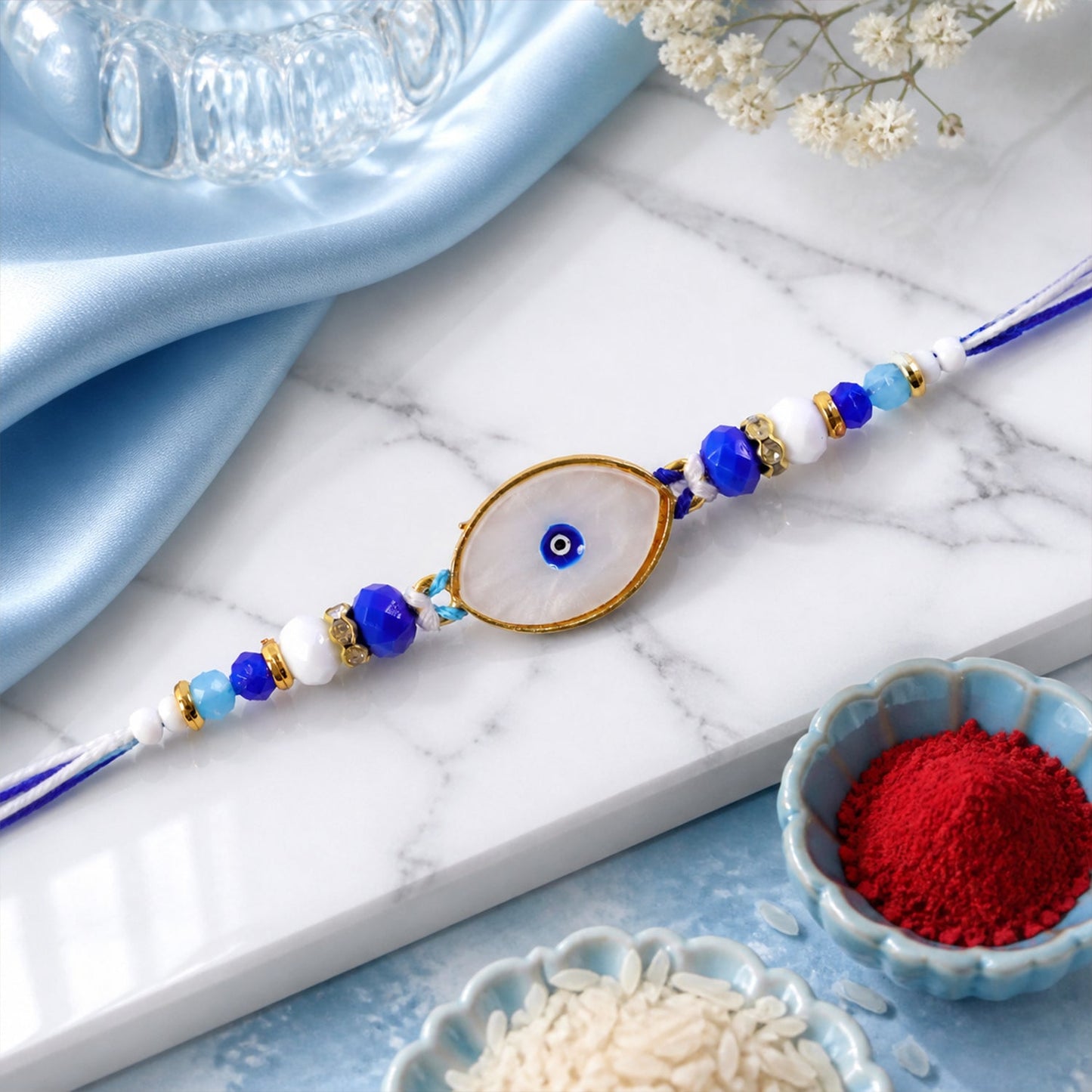 Oval Evil Eye Beaded Rakhi with Pearl Accent and Minimal Center Detail