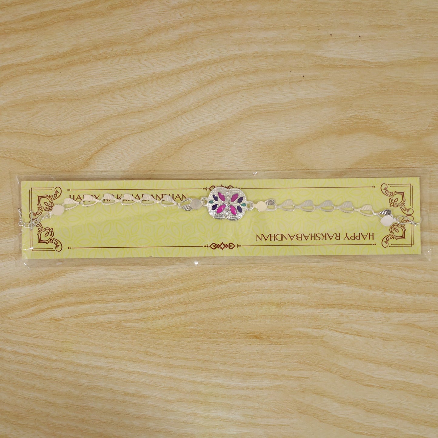 Premium Floral Stone Chain Rakhi with Elegant Center Charm Detail
