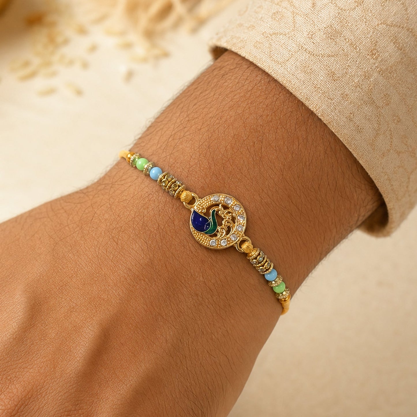 Premium Paisley Peacock Charm Bhai Bhabhi Lumba Rakhi with Pearl Drop