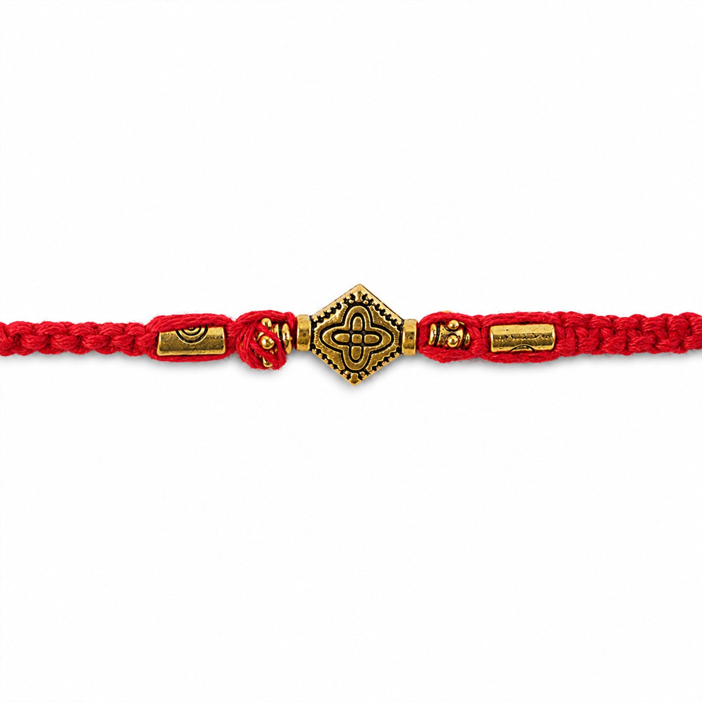 Red Thread Rakhi with an Intricately Detailed Antique Gold Charm