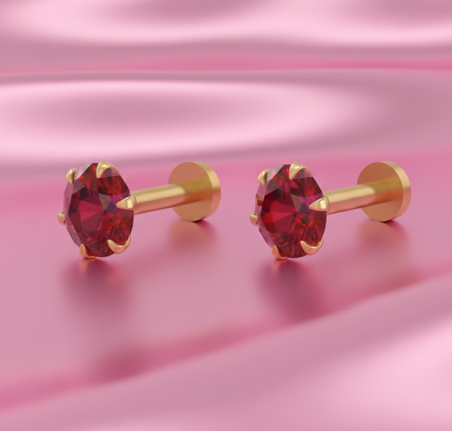 Close-up of ruby nosepin stud showing flat back design ideal for nose piercing