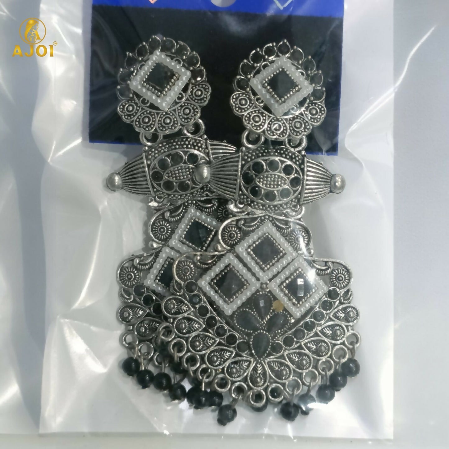 Oxidized silver chandbali earrings styled with ethnic attire