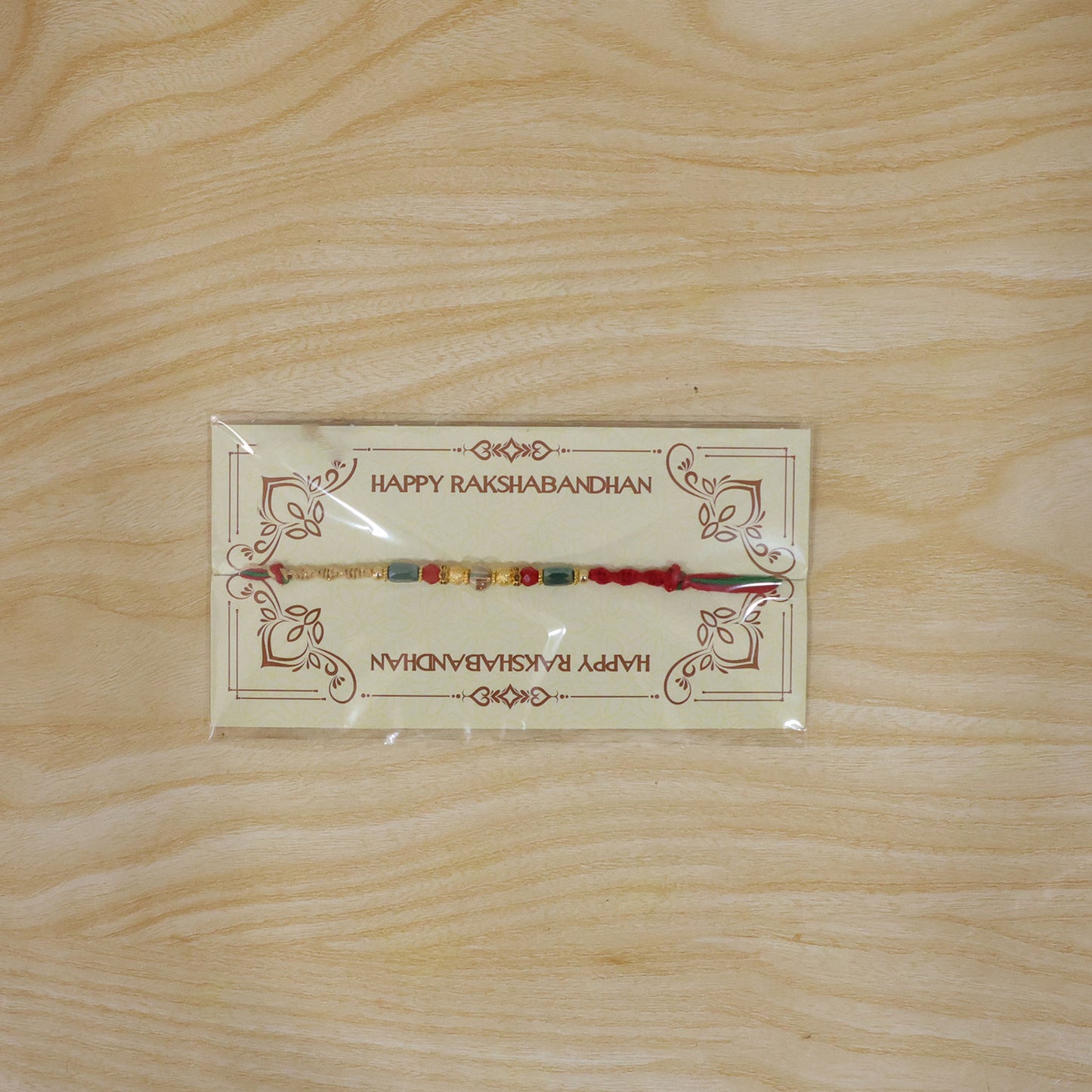 Beautiful Pearl Bead Rakhi with Soft Festive Shades and Elegant Designer Look