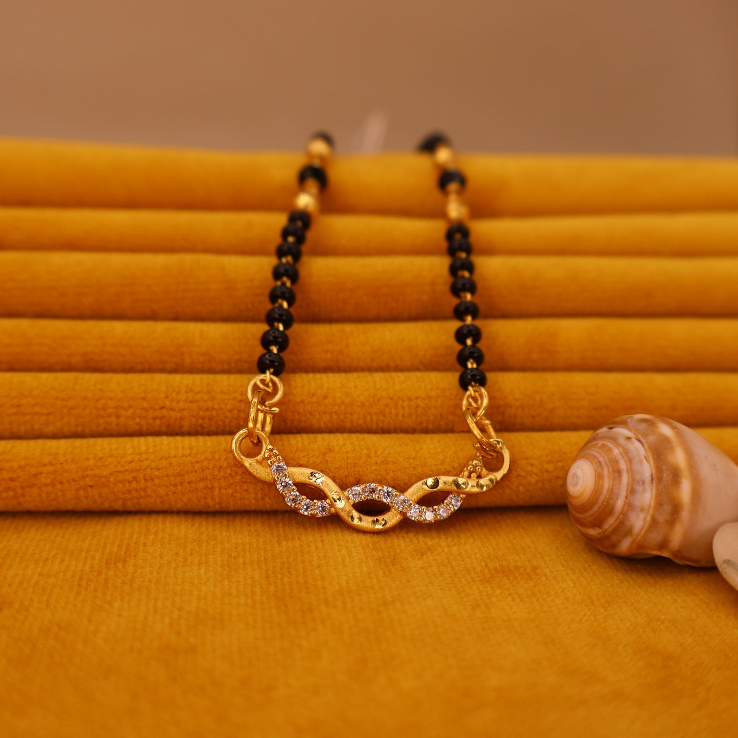 Gold Plated Infinity AD Mangalsutra with Black Beads