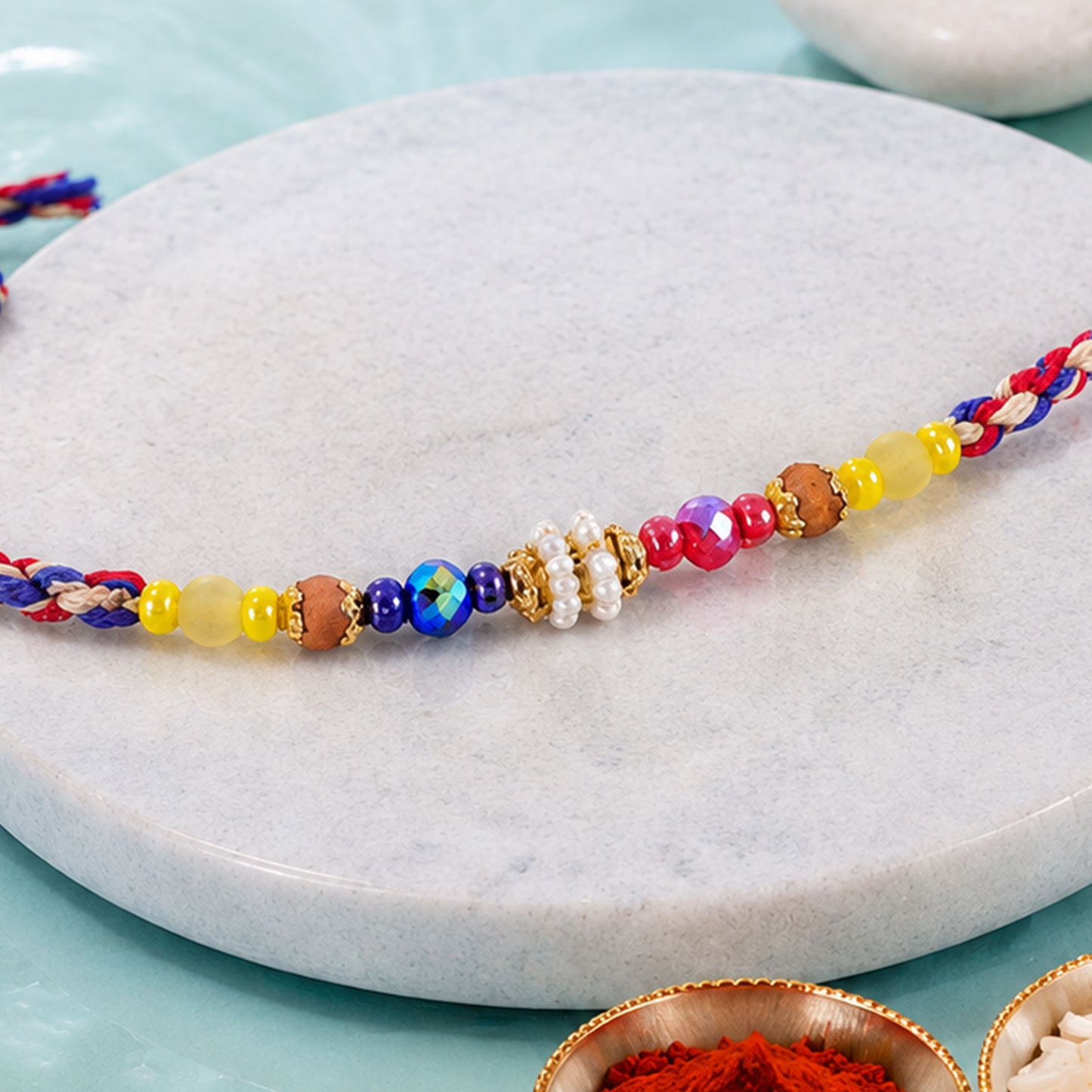 Rainbow Beaded Charm Rakhi with Colorful Festive Style and Playful Bracelet Look