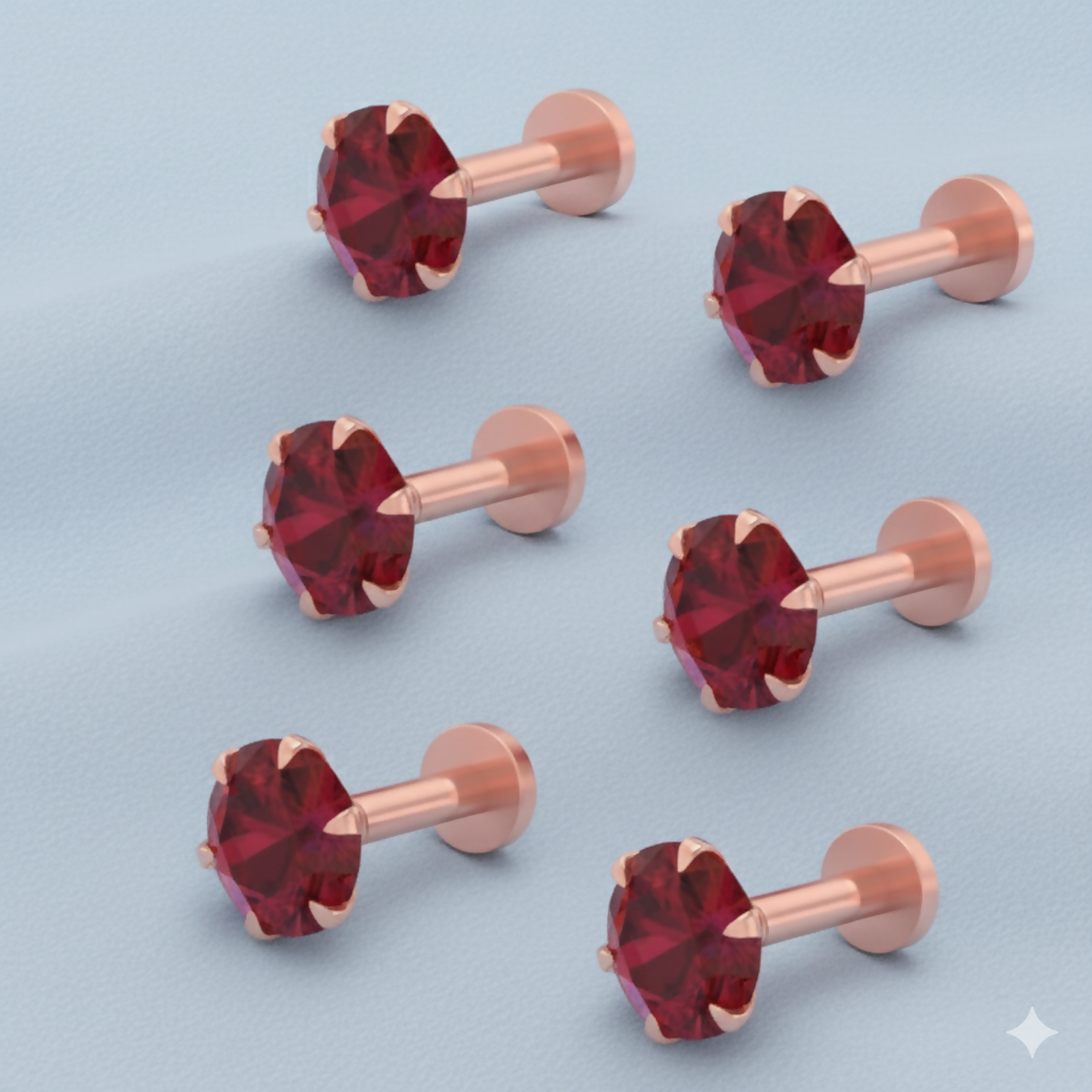Close-up of rose gold plated ruby nosepin stud showing 2mm lab-grown ruby
