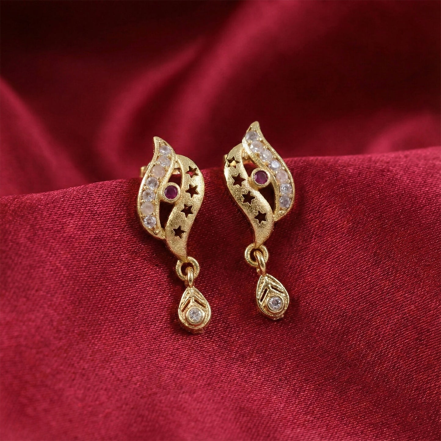 Star Cut Pattern Gold Finish Earrings With Crystal Detailing And Teardrop Charm