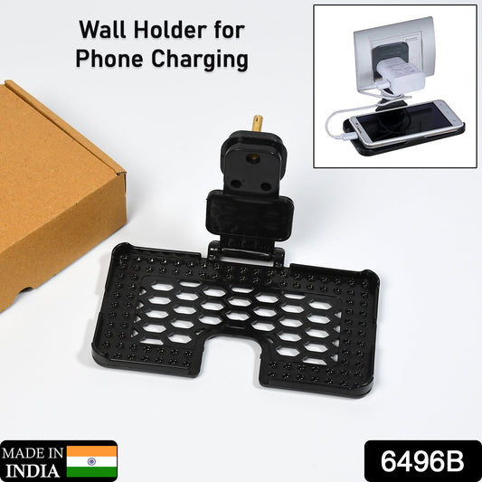 Phone charging securely placed on wall socket holder stand