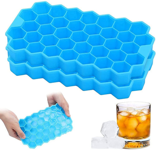 Green flexible silicone ice cube tray with innovative honeycomb pattern.