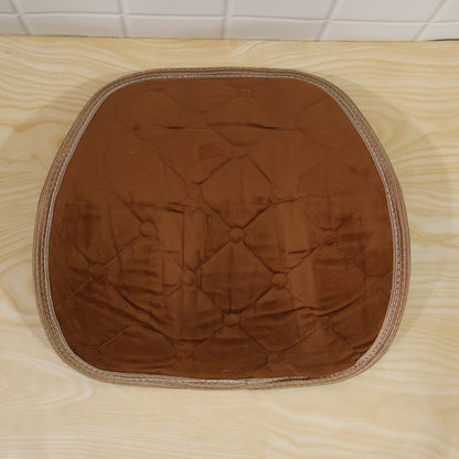 Brown quilted velvet lumbar support cushion from different angle