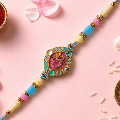Turquoise Om Pendant Rakhi with Pink Kundan and Pastel Beads