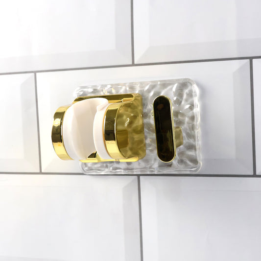 Wall mounted broom and mop holder