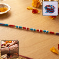 Handmade Pearl Beaded Rakhi – Elegant Traditional Gifting