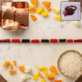 Handmade Rakhi – Traditional Beaded Thread with Golden Accents