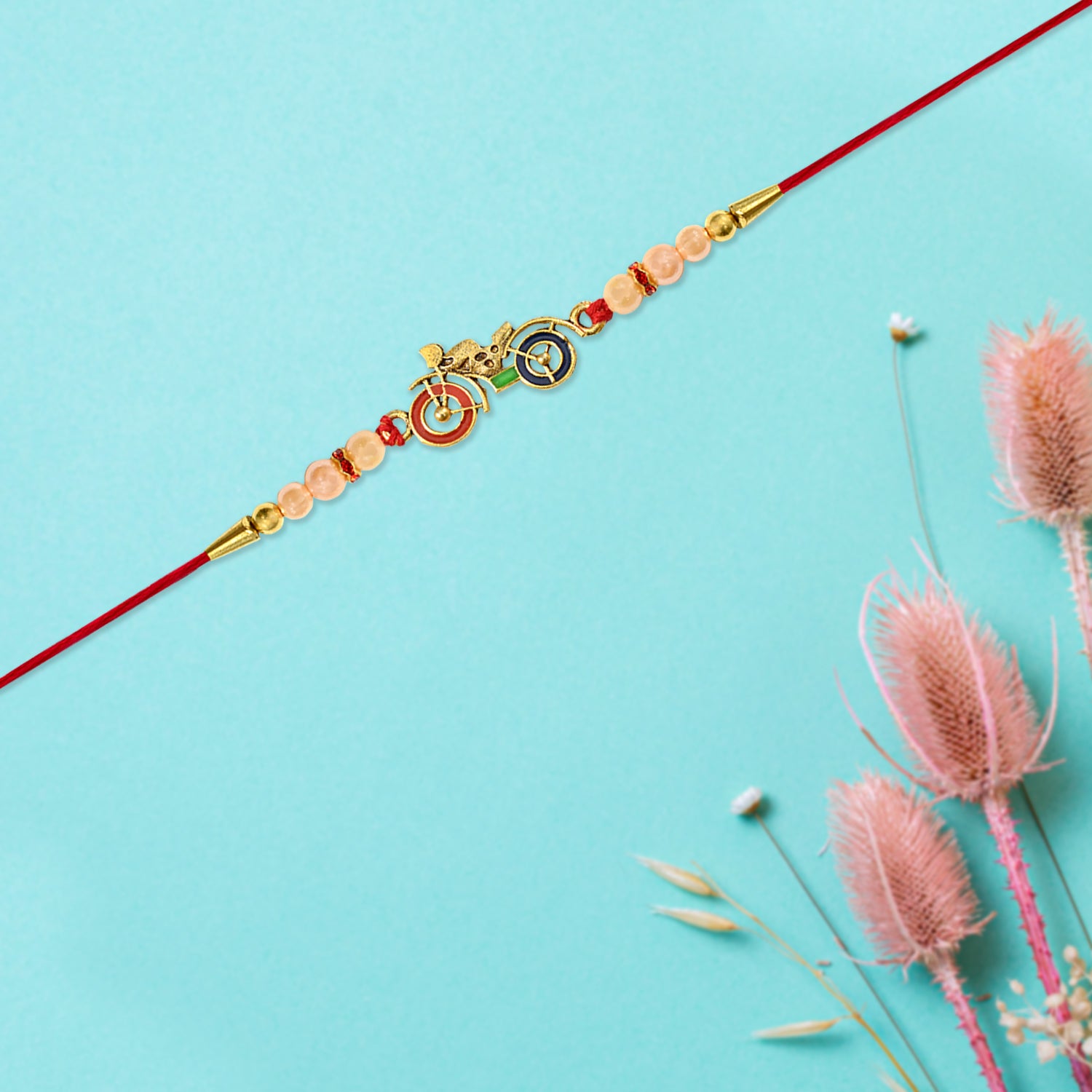 Motorbike Theme Rakhi with Golden Bike Charm and Pearl Beads – Trendy Raksha Bandhan Bracelet for Brother
