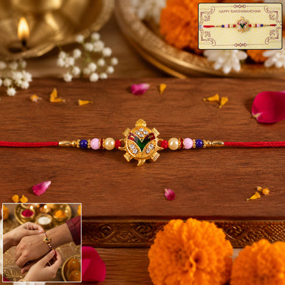 Traditional Tortoise Charm Rakhi displayed on a decorative surface