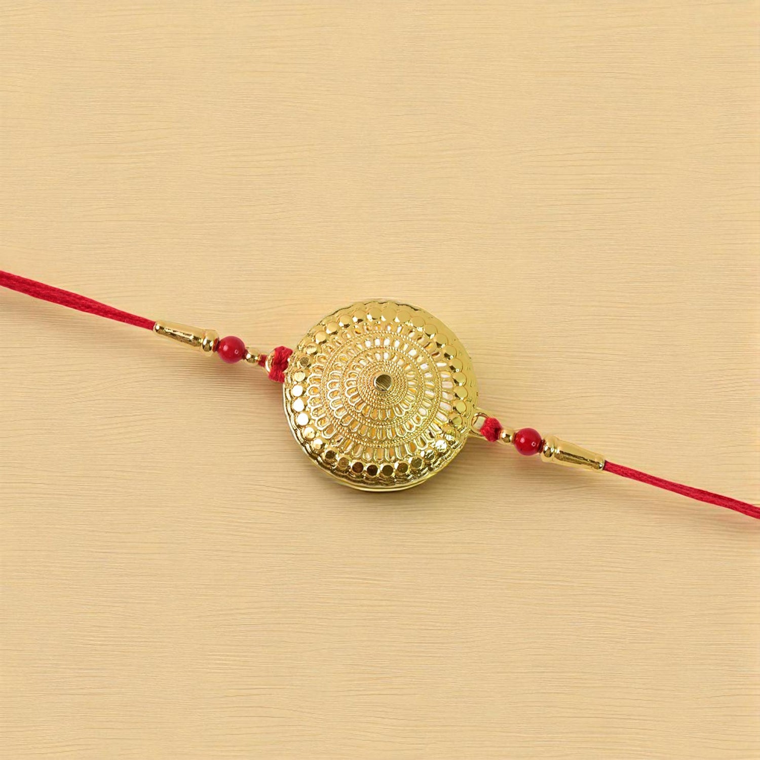 Variety of gold accent rakhis in the festive Raksha Bandhan set for brothers