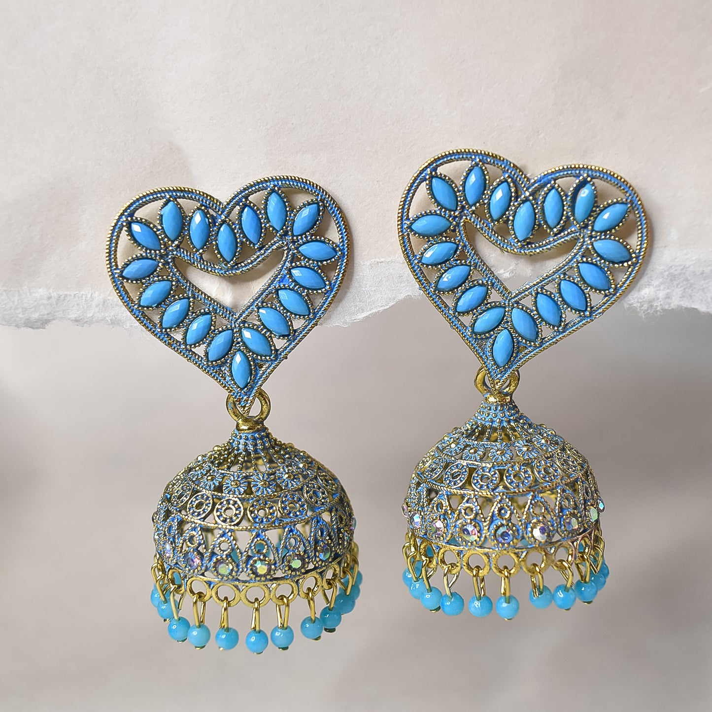 Heart-Shaped Blue-Coloured Jhumka Earrings with Elegant Detailing