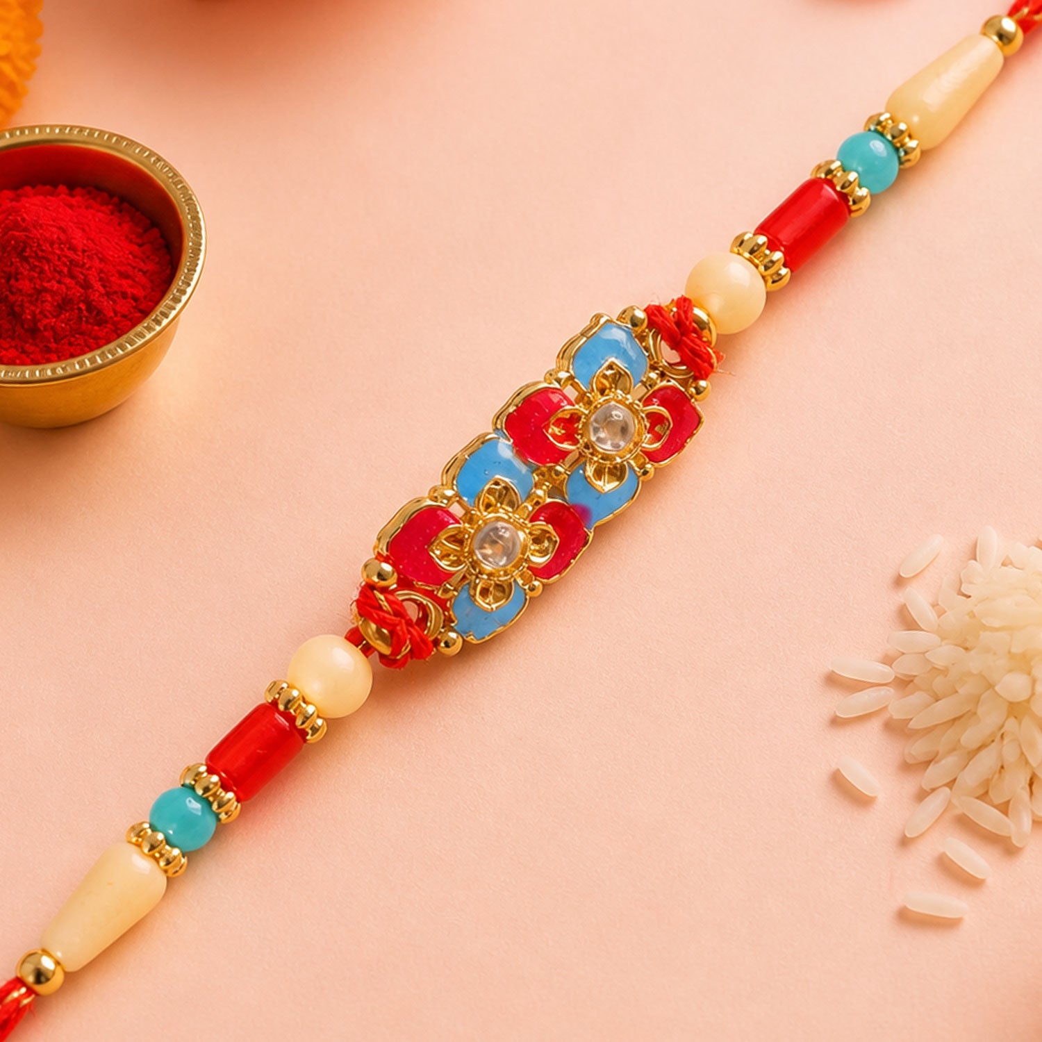 Multicolor Floral Kundan Pendant Rakhi with Red and Blue Beads
