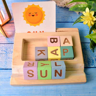 Child playing with the Aditi Alphabet Puzzle for Kids, matching letters to flashcards.
