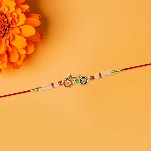 Motorbike Theme Rakhi with Golden Bike Charm and Pearl Beads – Trendy Raksha Bandhan Bracelet for Brother