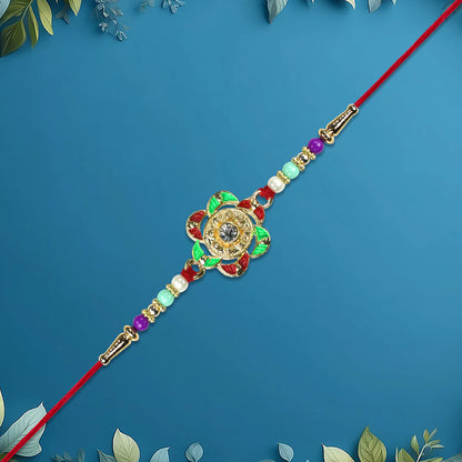 Traditional Gold Plated Rakhi showcasing its detailed craftsmanship.