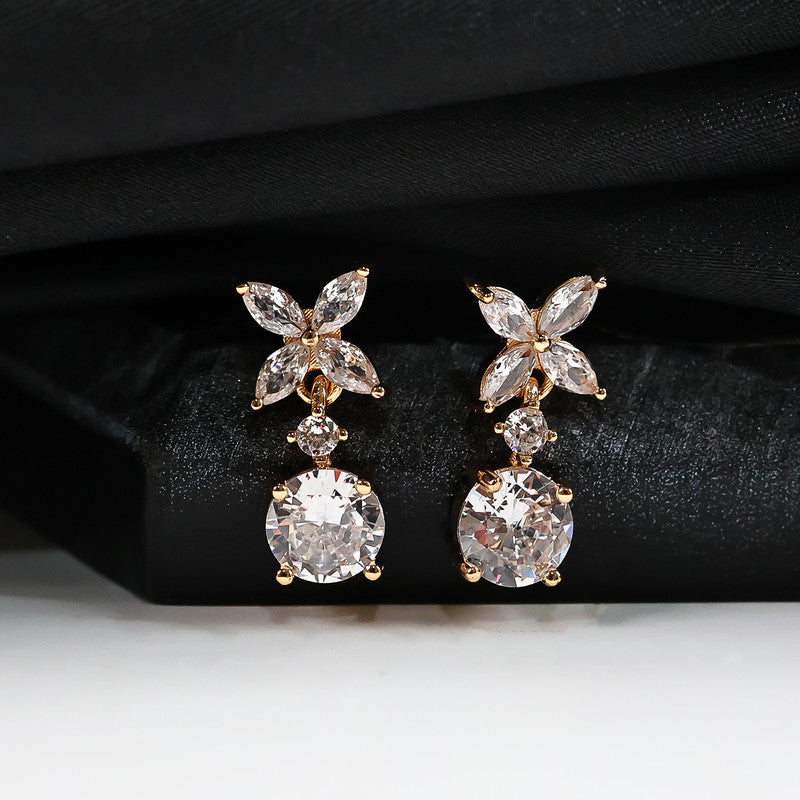 Pair of floral CZ diamond drop earrings showcasing intricate design