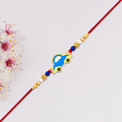 Car design Rakhi for kids displayed on a child's wrist, celebrating Raksha Bandhan.