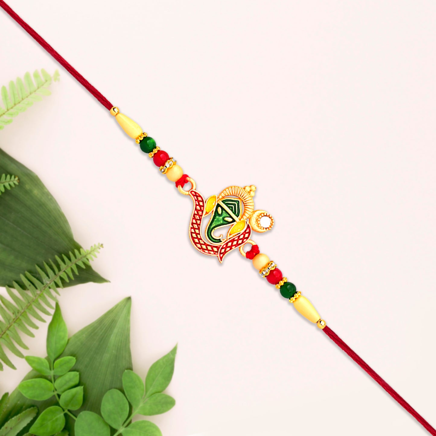 Ganpati Rakhi detailed craftsmanship and thread