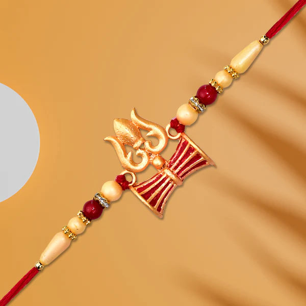 Shiva Trishul Rakhi with its festive packaging, ready for gifting on Rakshabandhan.