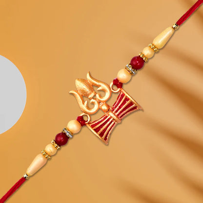 Shiva Trishul Rakhi with its festive packaging, ready for gifting on Rakshabandhan.