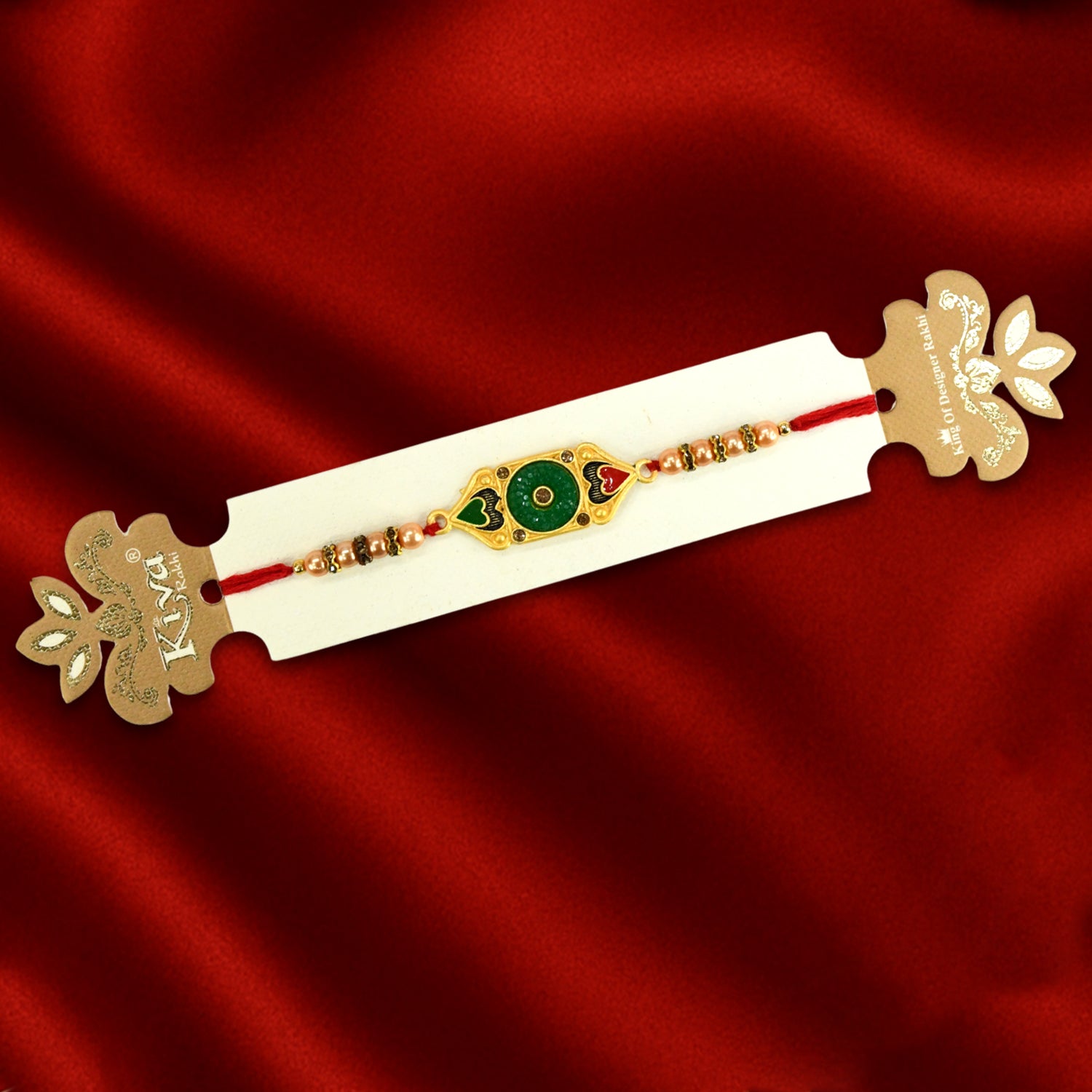 Ethnic Green & Gold Rakhi with Red-Green Heart Motif and Beaded Thread Design
