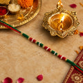 Designer Rakhi – Handmade with Golden Beads & Ethnic Threads