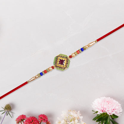 Designer Stone Rakhi with Red Centerpiece, Pearl Beads & Colorful Detailing – Elegant Thread for Raksha Bandhan