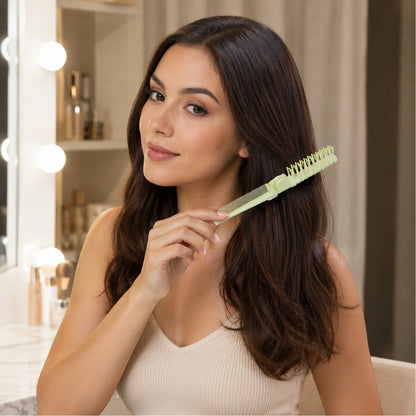 Angled view of foldable 2-in-1 hair comb & brush